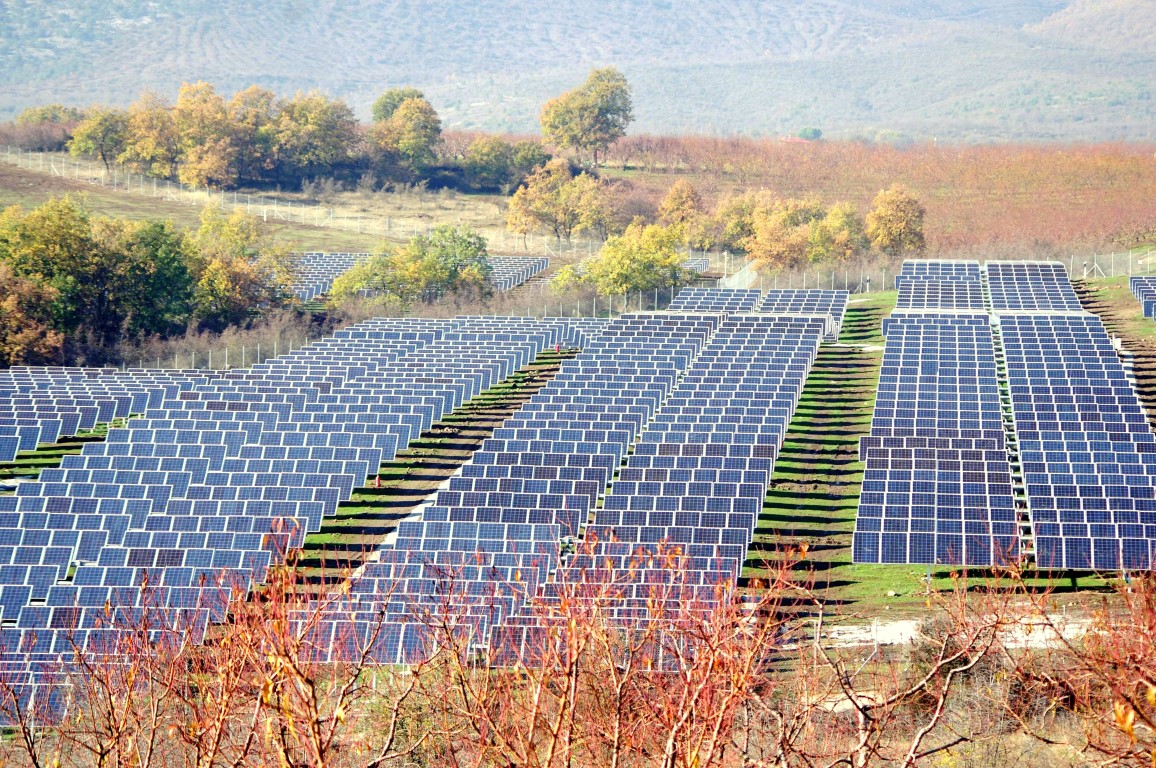 Horizontal single-axis tracker array (8 MW installation, Greece). Modules rotate about a north-south horizontal axis.