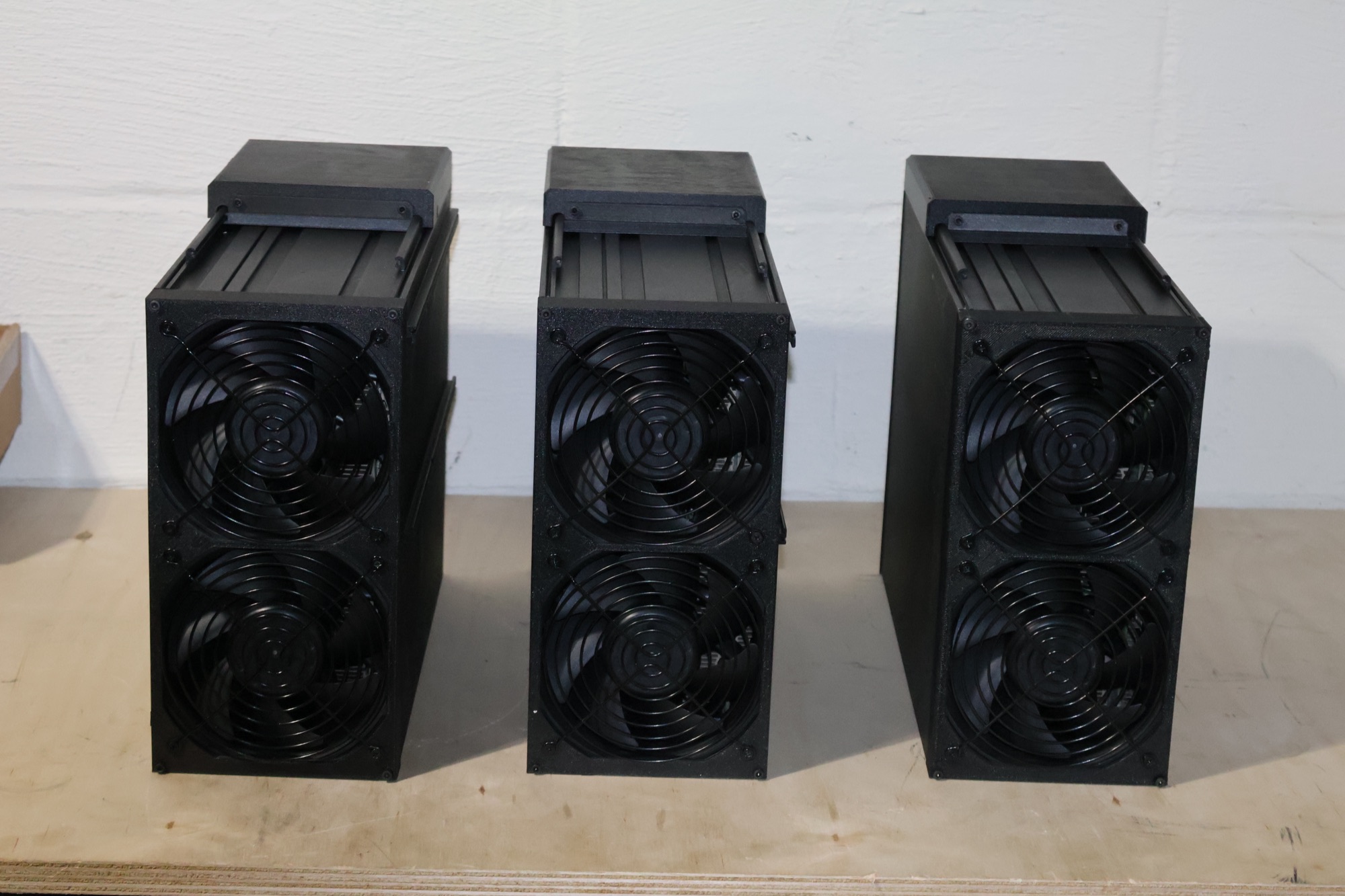 Three finished SLIM19 rigs standing side by side